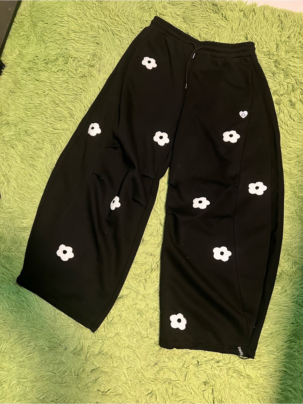 Aelfric Eden Black Wide-Leg Sweatpants with White Flower Accents